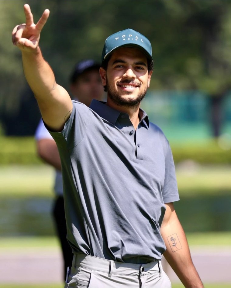 Jugador de la GPM con gorra Nopal verde celebrando